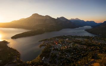 The town of Waterton view from above at sunrise from Bear's Hump.