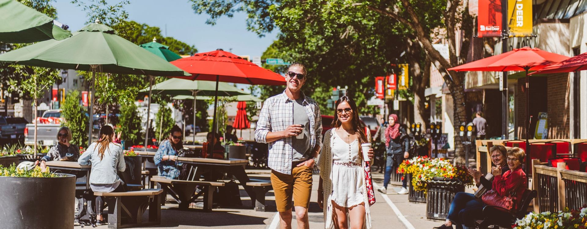 Couple walking in downtown Red Deer.