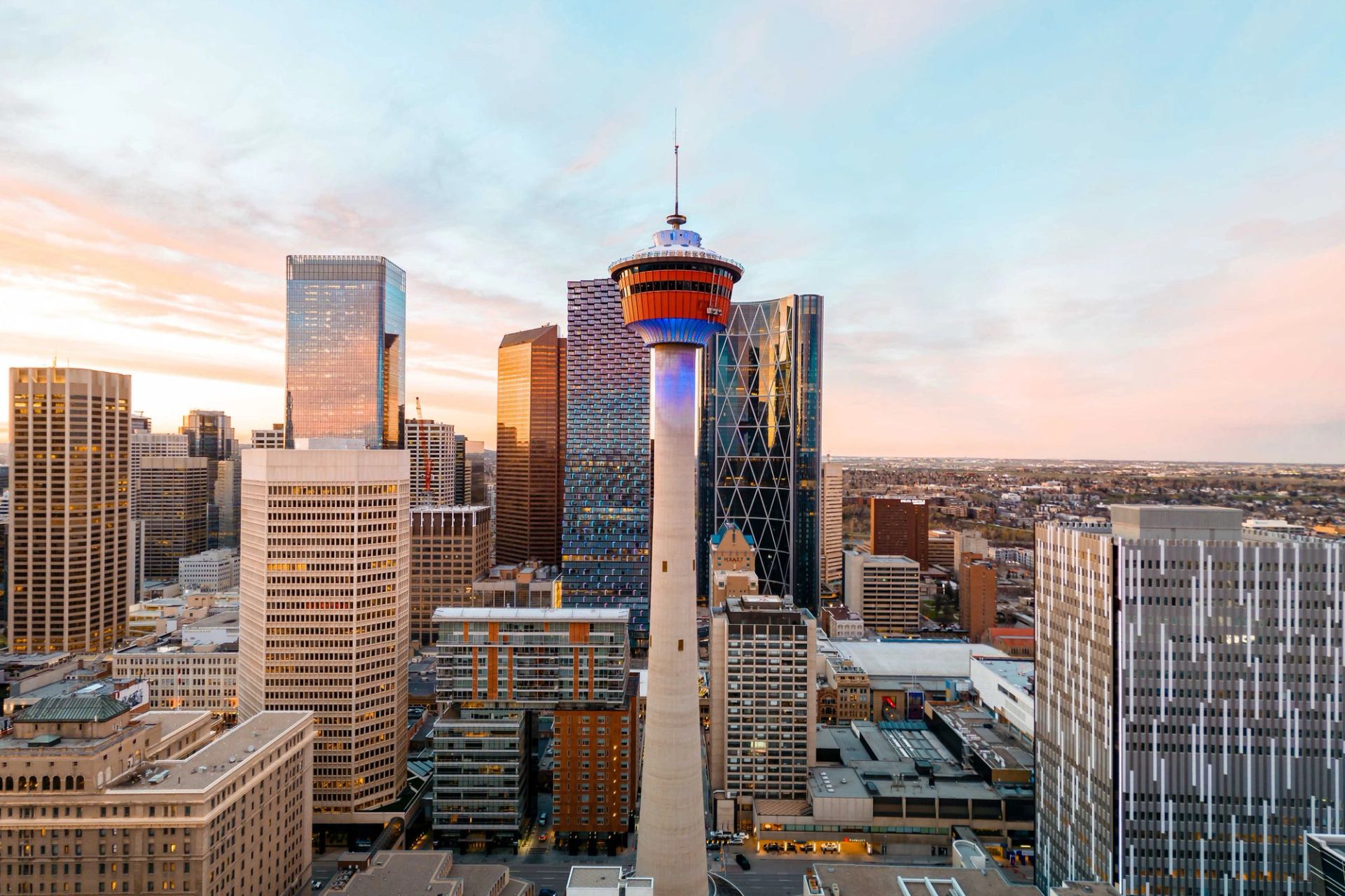 A cityscape shot of the Calgary Tower in downtown Calgary.