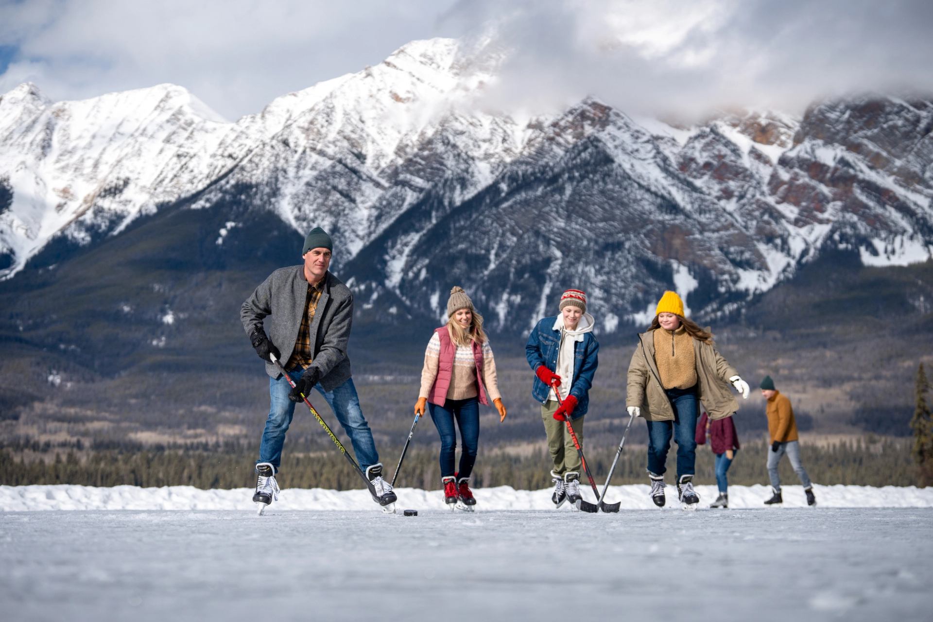 Family playing hockey on Pyramid Lake.