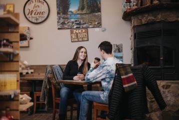 Couple eating at Miners Mercantile and Bakery in Pincher Creek