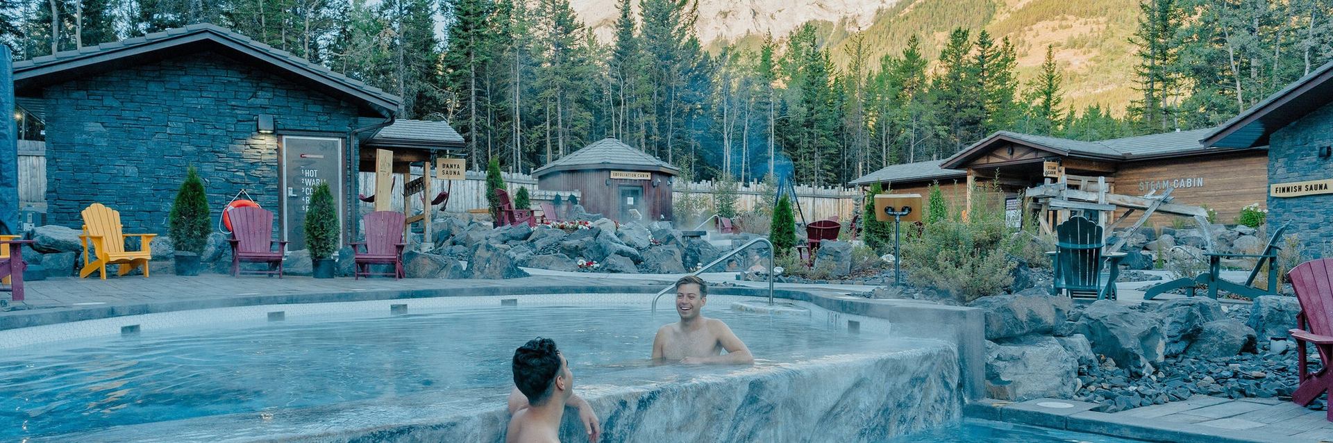 People in the pool at The Nordic Spa at Pomeroy Kananaskis Mountain Lodge.