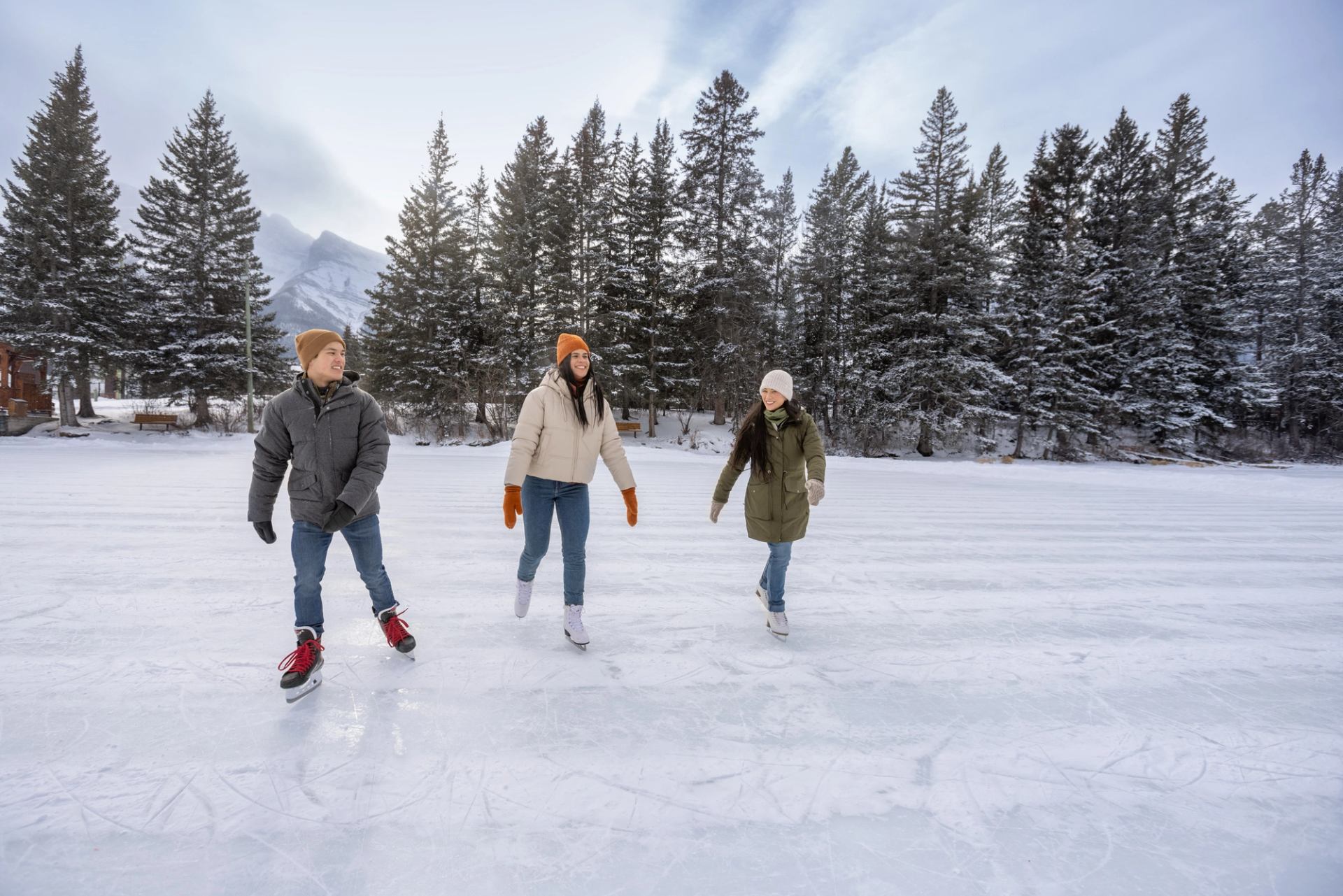 Group of people ice skating in Canmore.