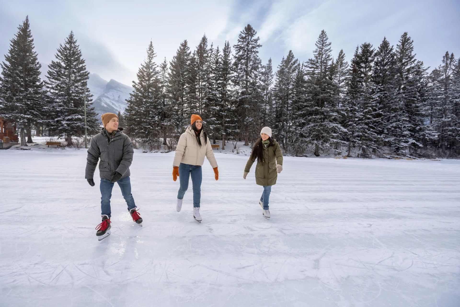 Group of people ice skating in Canmore.