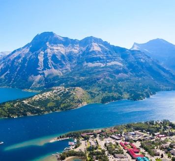 View of the lake and mountains around Waterton townsite from the Bear's Hump in Waterton Lakes National Park.