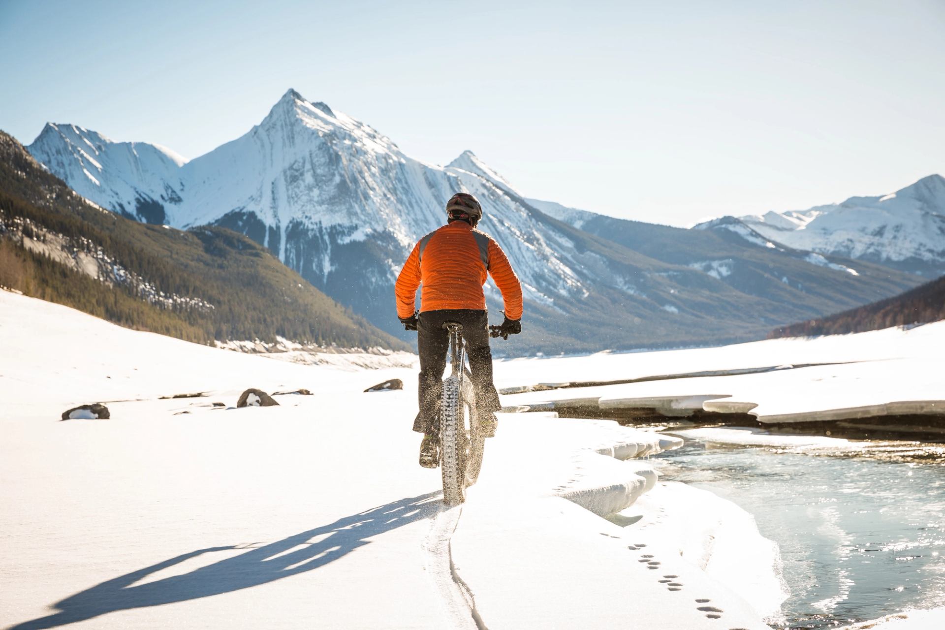 Person fatbiking on Maligne Lake