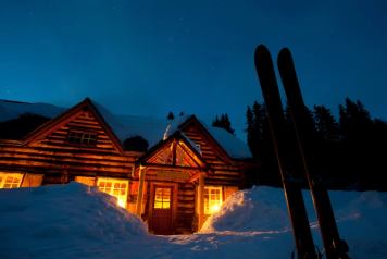 Skoki Lodge is a backcountry lodge at an elevation of 7,100 feet (2,164 meters) in the high alpine of Banff National Park, only accessible by hiking or skiing the 11 kilometer trail that begins at the Lake Louise Ski Area.
