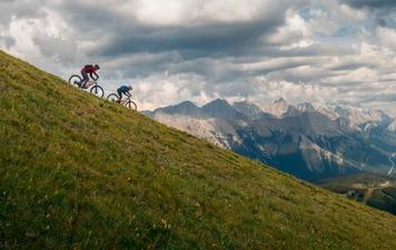 Two Mountain Bikers ride down Fortress Mountain