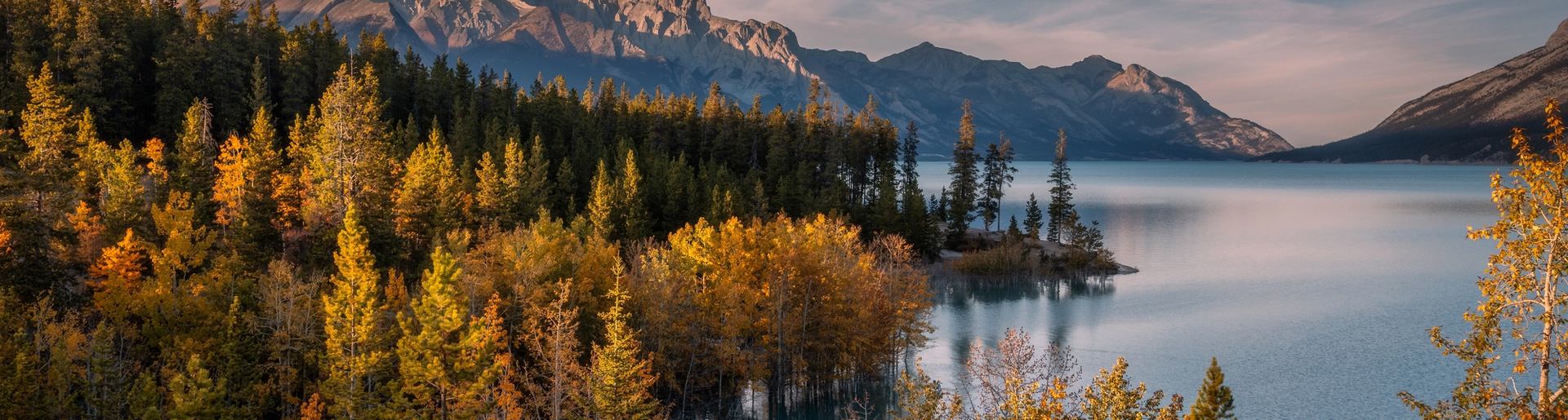 View of Abraham Lake and Mount Abraham in Alberta's Canadian Rockies at sunset