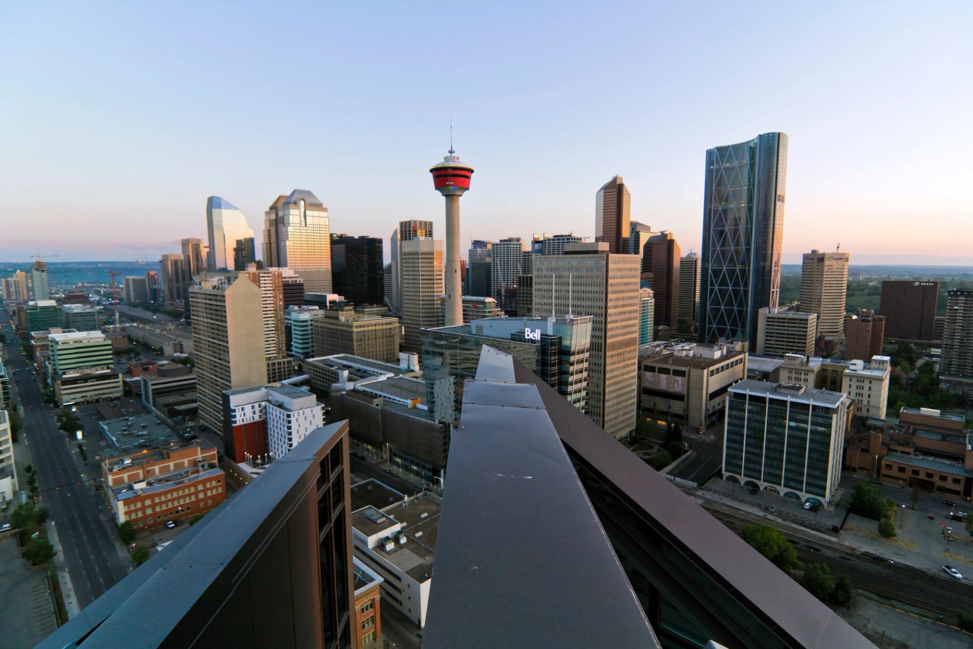 View of downtown high rises and the Calgary Tower from the top of a building in Calgary