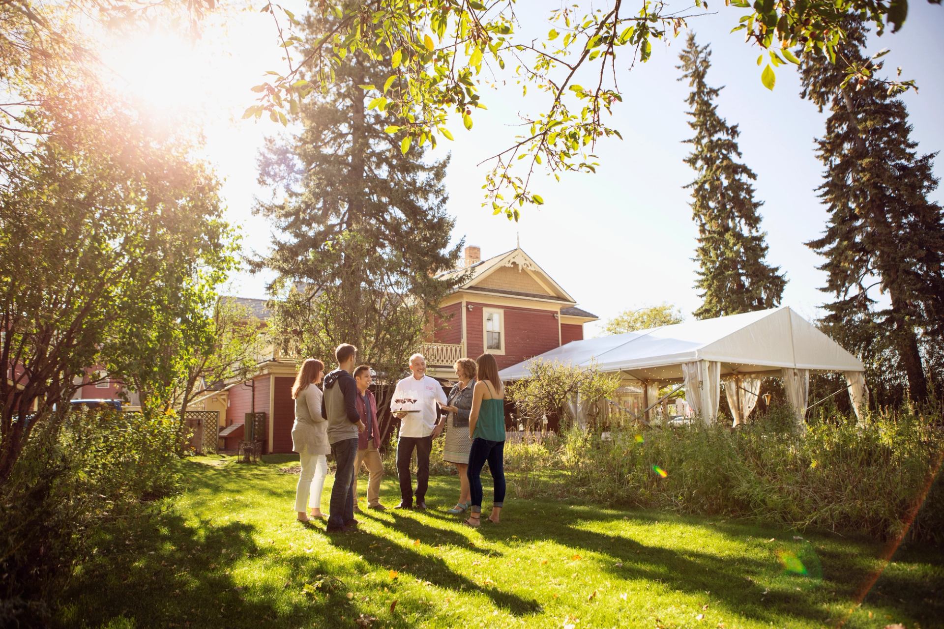 A group of people learning about Rouge’s farm-to-fork process in Calgary.