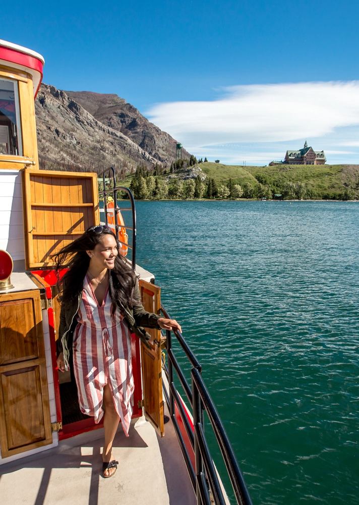Women on the boat of a Shoreline Cruise at Waterton Lake