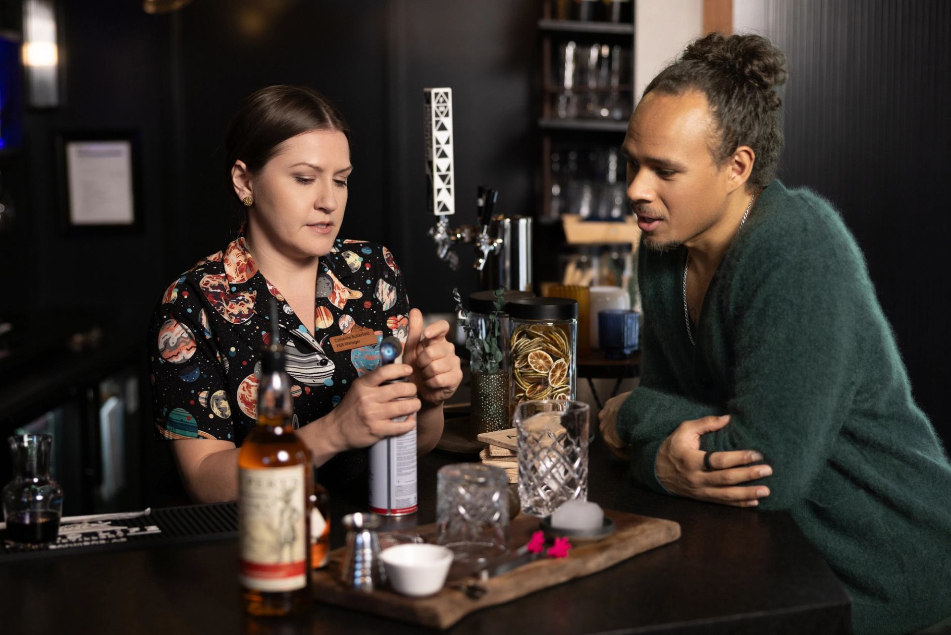 Aalto's food & beverage manager Catherine Butterfield making cocktails at the bar with Elladj Baldé, host of One Perfect Meal.