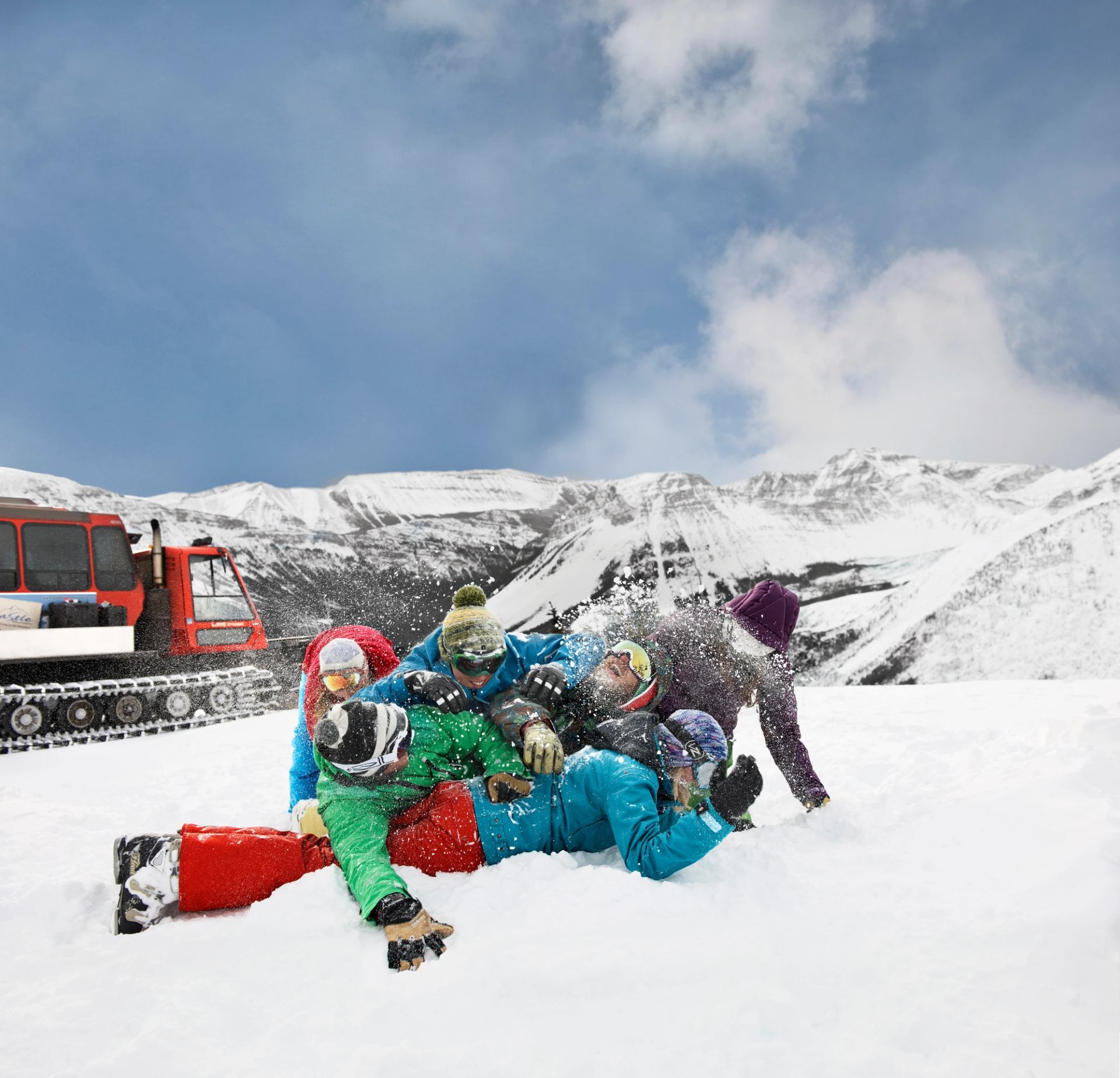 Group of snowboarders playing in the snow on Castle Mountain in Southern Alberta.