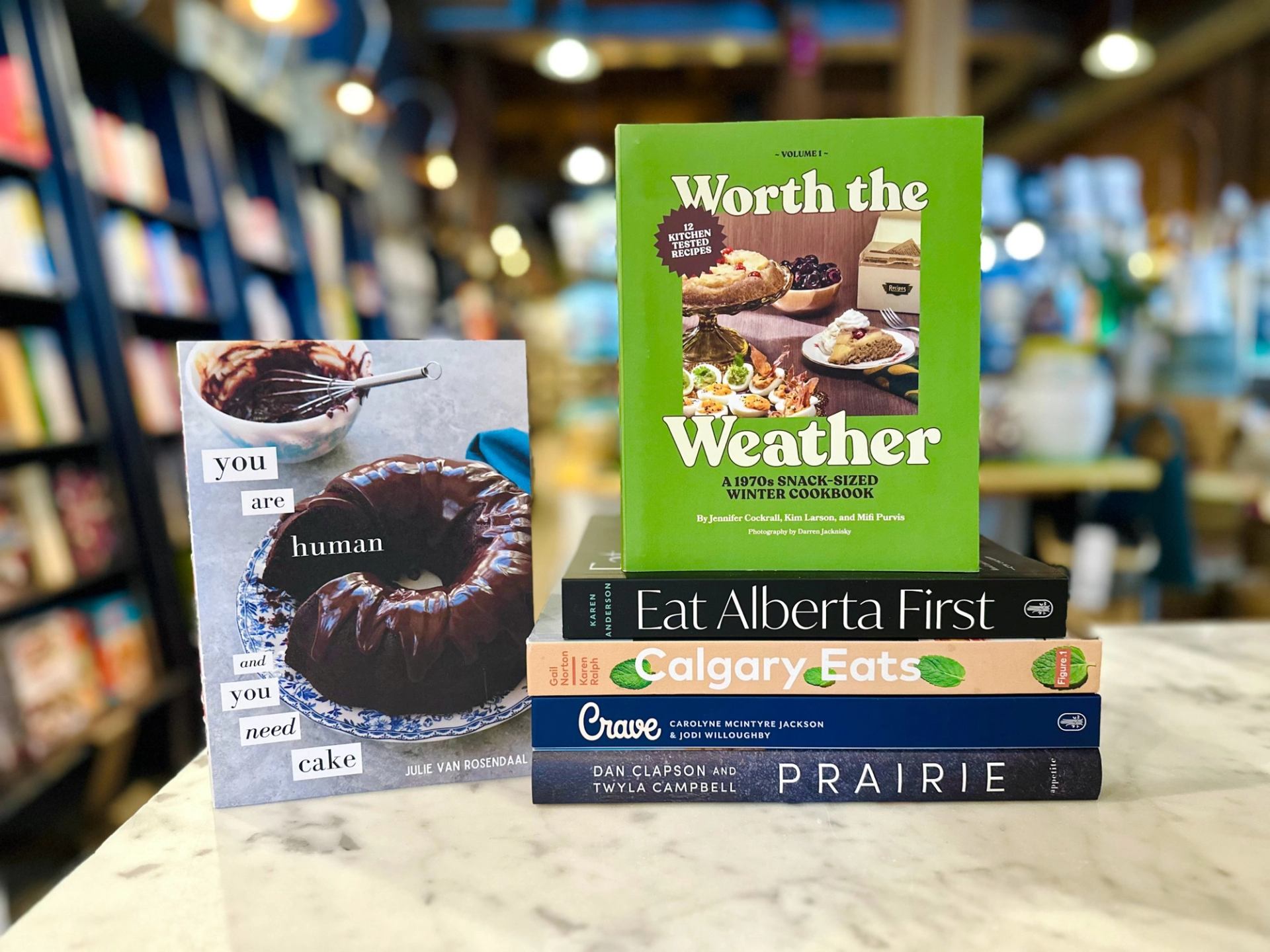 A selection of cookbooks by Alberta authors on display.