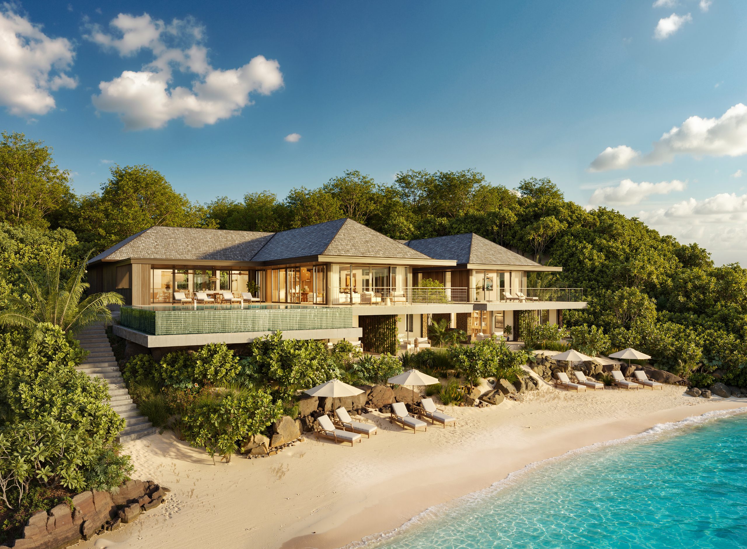 Beachfront villa above white sand, designed by Mark Cooney