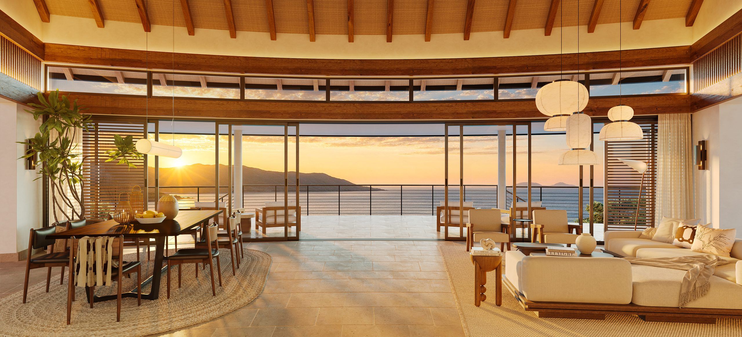 Living and dining opening to a sunset terrace, designed by Mark Cooney