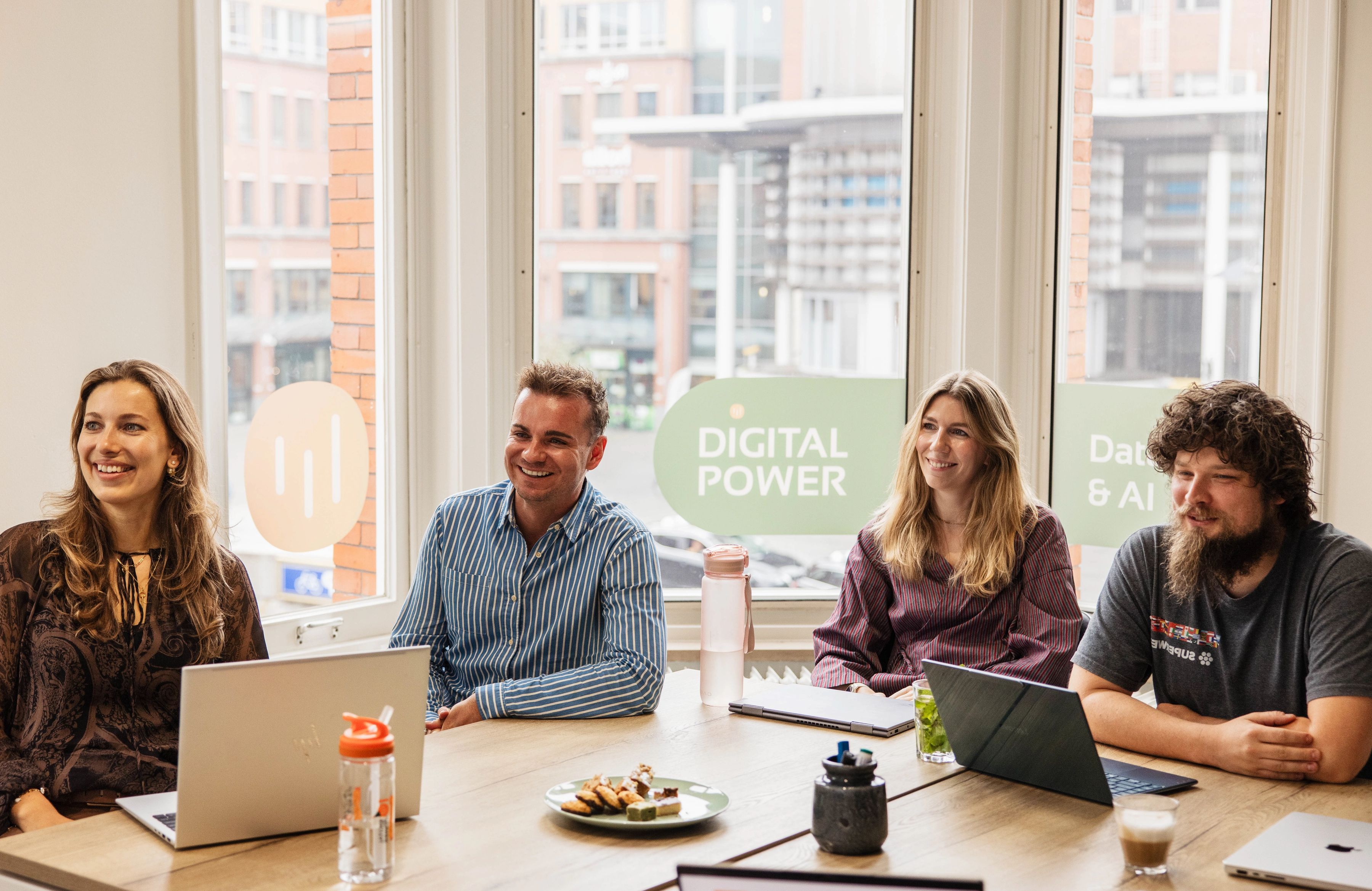 Customer Experience specialists in a meeting