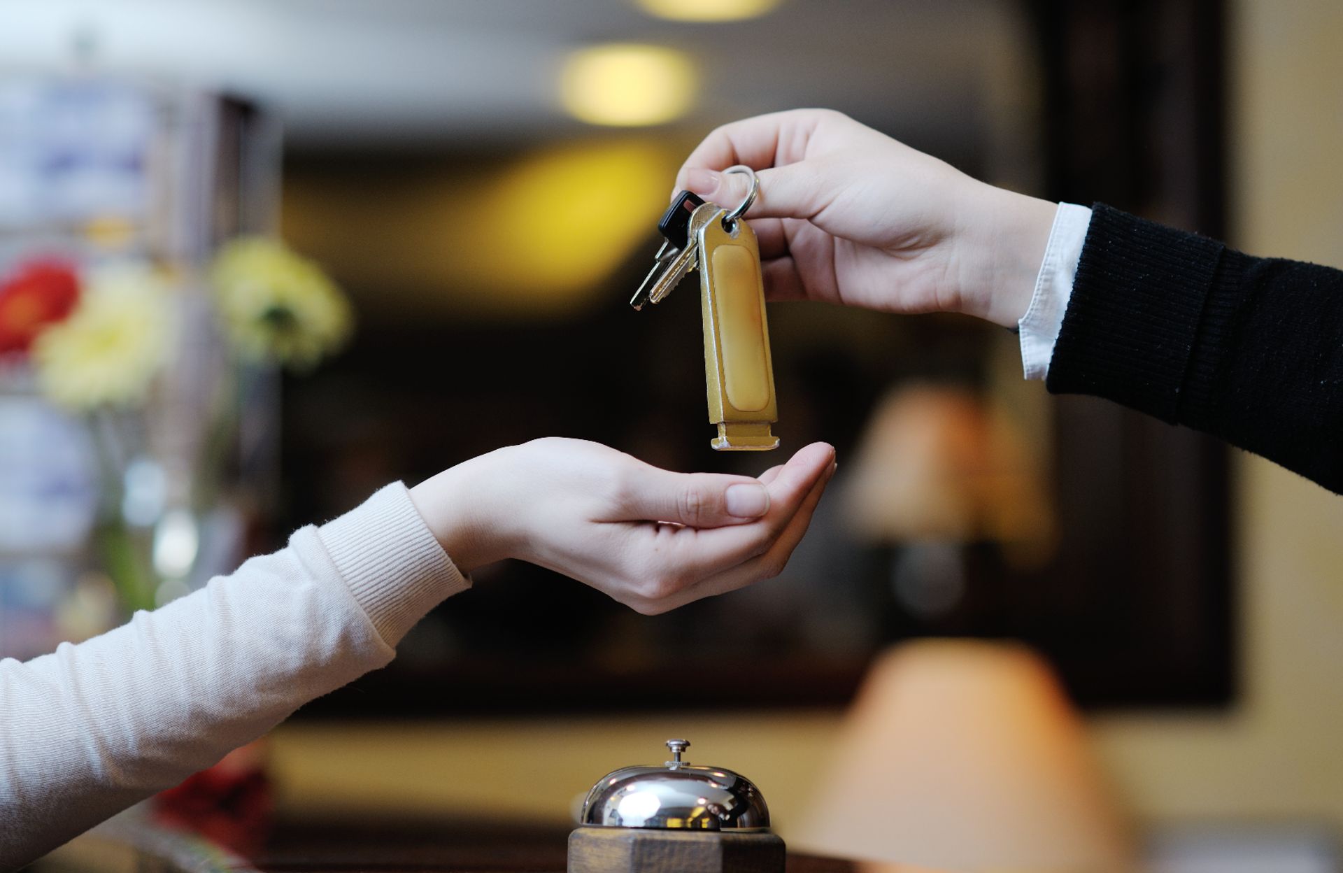 Handing over the keys at a hotel
