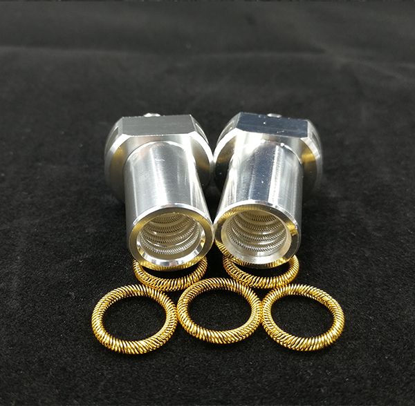 Machined female connector sockets with internal canted coil springs and loose gold-plated spring rings