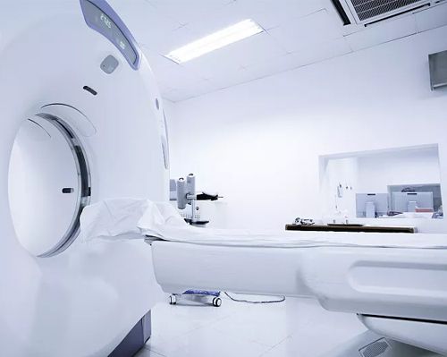 Medical CT or MRI scanner imaging room representing medical connector application cases