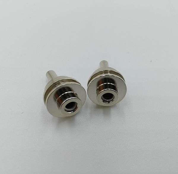 Pair of nickel-plated machined female connector sockets with internal canted coil spring contacts