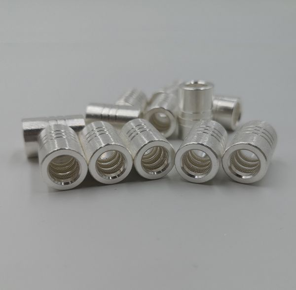Silver plated connector sockets with internal canted coil springs and outer grooved barrels