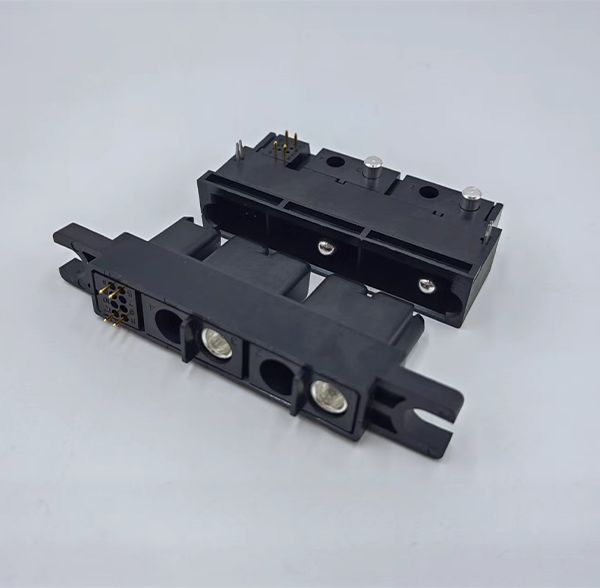 Modular high-current power connector housings with silver-plated contact sockets and gold-plated signal pins