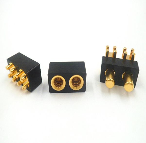 Two-pin connector modules with gold-plated spring-loaded sockets and matching contact pins in black housings