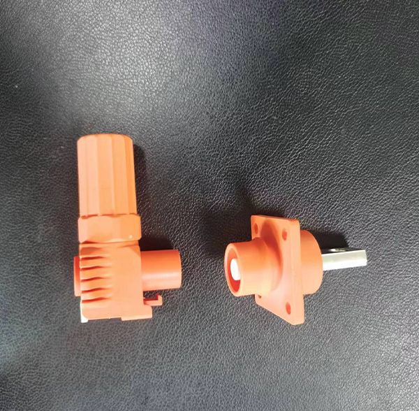 Orange high-voltage connector plug and flanged receptacle socket for energy storage applications