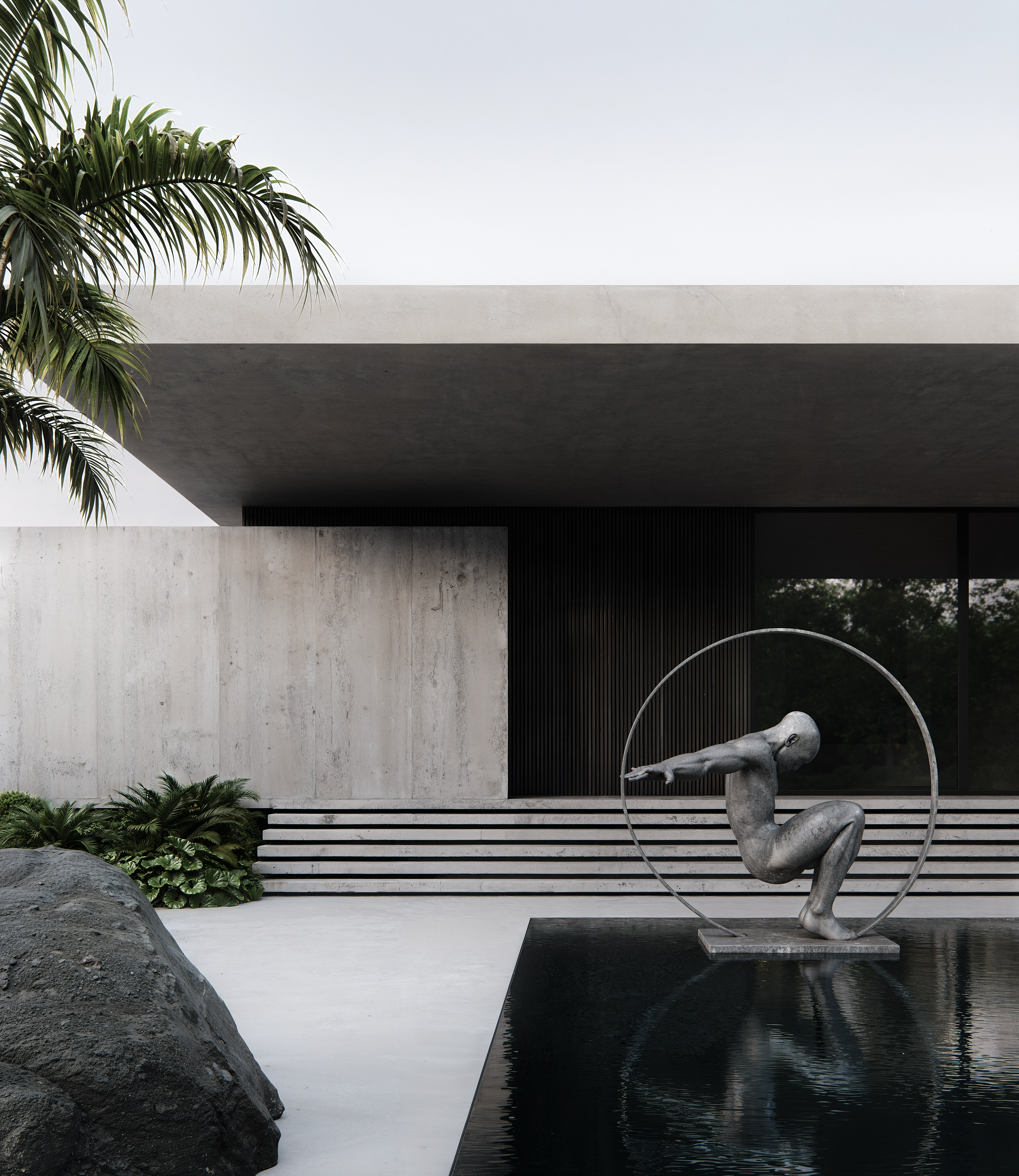 Intersecting linear concrete volumes framing ocean views
