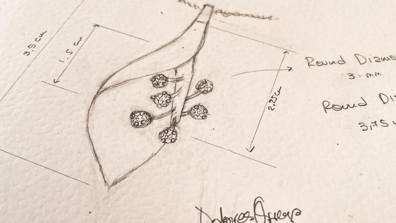 Hand-drawn initial sketch by Dolores Ortega showcasing an early jewelry design concept.
