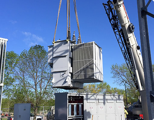 Crane lifting primary transformer at SMSU campus