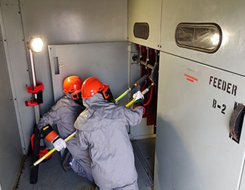 Crew working on switchgear