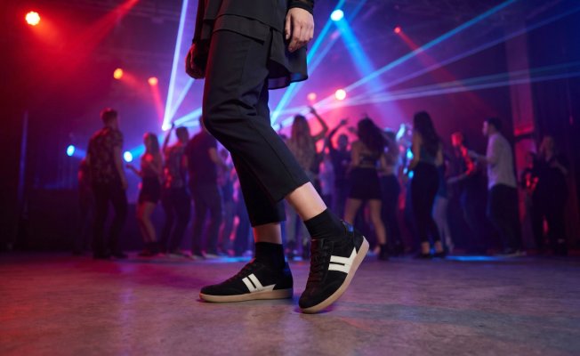 Black trainers in a club