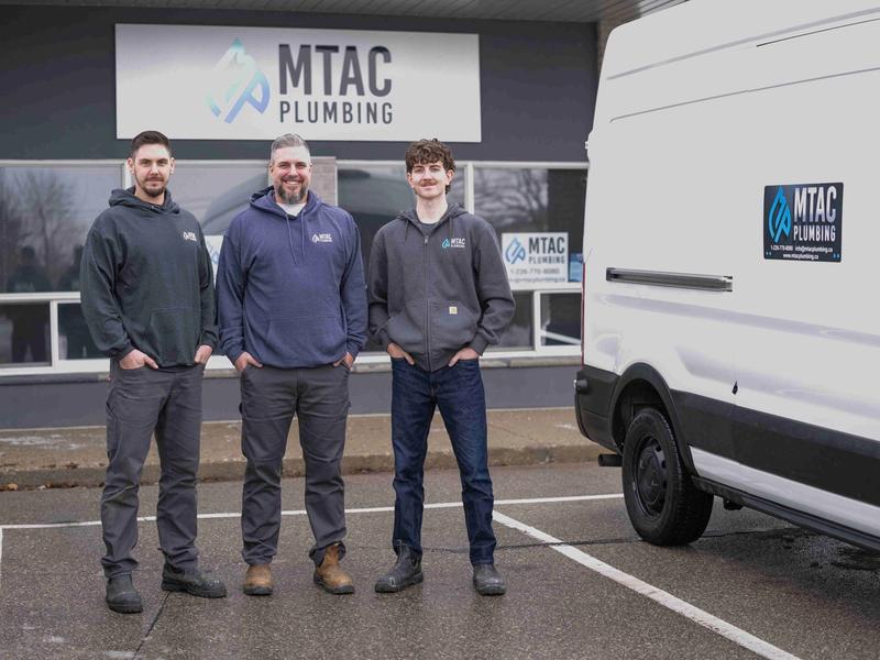 MTAC team and truck in front of our shop