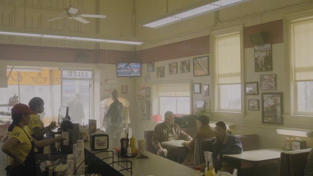 Interior of Ben’s Chili set on soundstage, Light Storm 1200d Pros focused outside window aiming into the diner