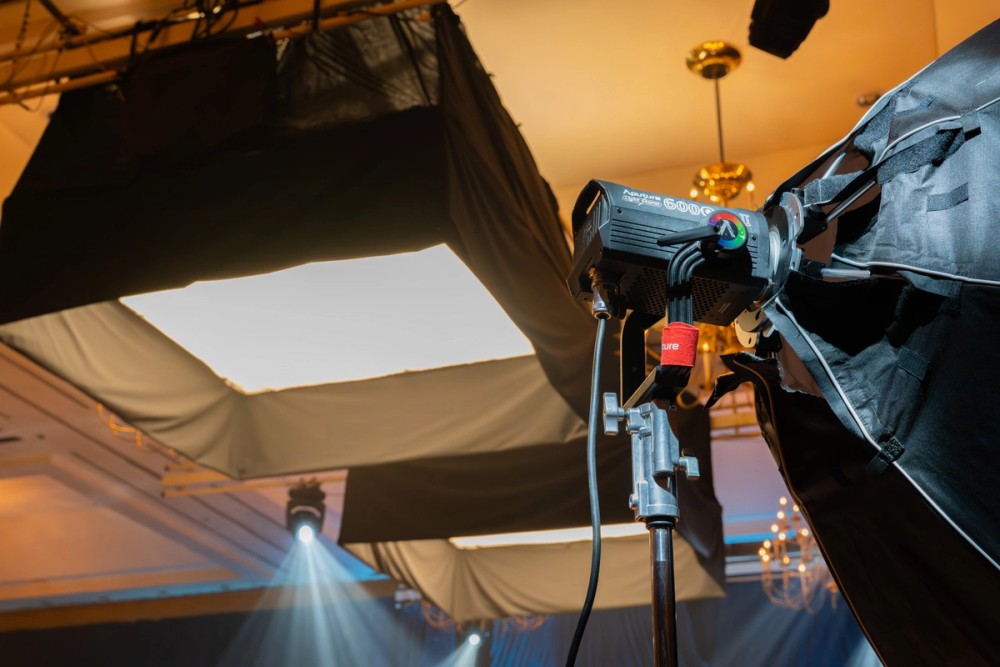 An INFINIMAT 8x8 and a LS 600c Pro II rigged to shape and color the ballroom