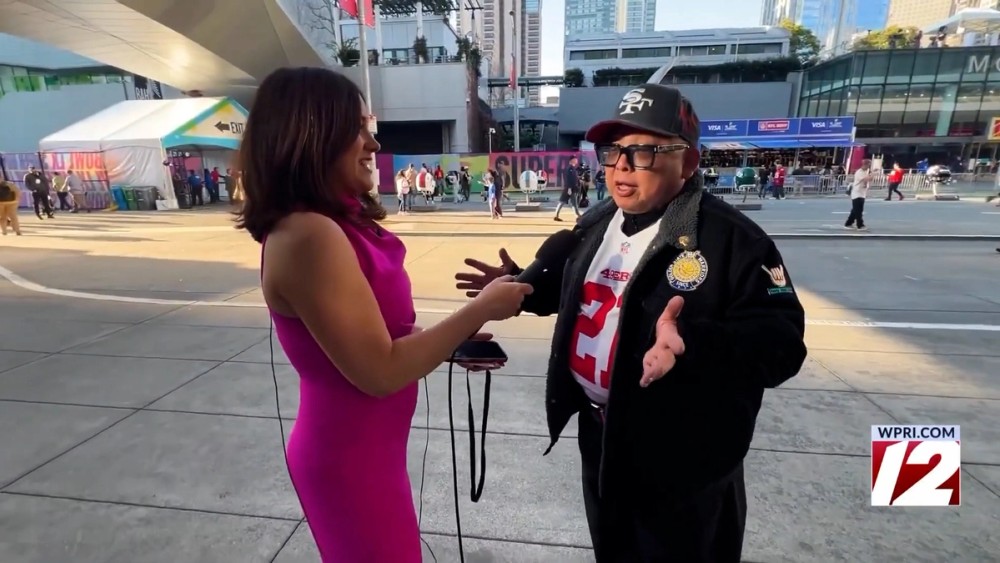 Reporter Kait Walsh interviews a fan at the Moscone Center