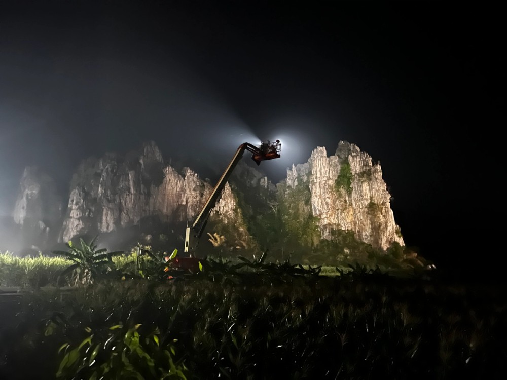 A Light Storm 1200d mounted to a cherry picker for night shooting