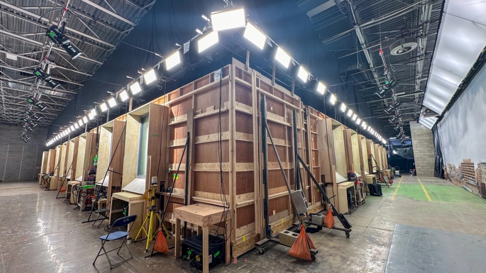 Nova P600c panels rigged in a dense horizontal array facing toward a scenic backdrop