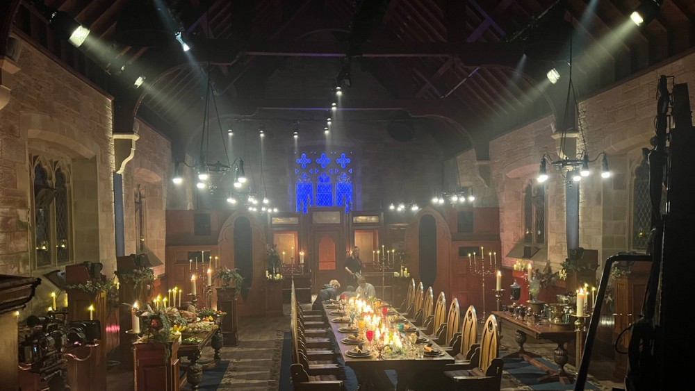 The church dining table, lit with B7c bulbs in chandeliers and STORM 80cs