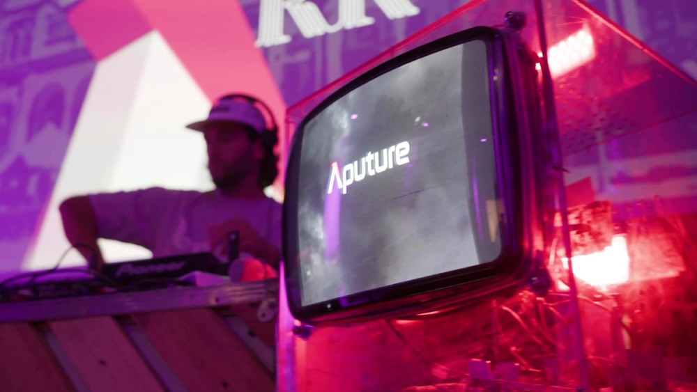 Tradeshow attendees at Aputure booth at IBC 2024