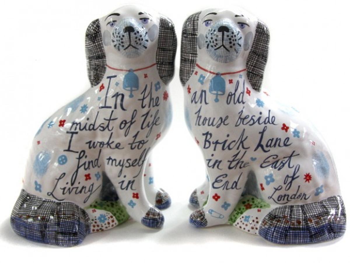 Two hand-painted ceramic dogs