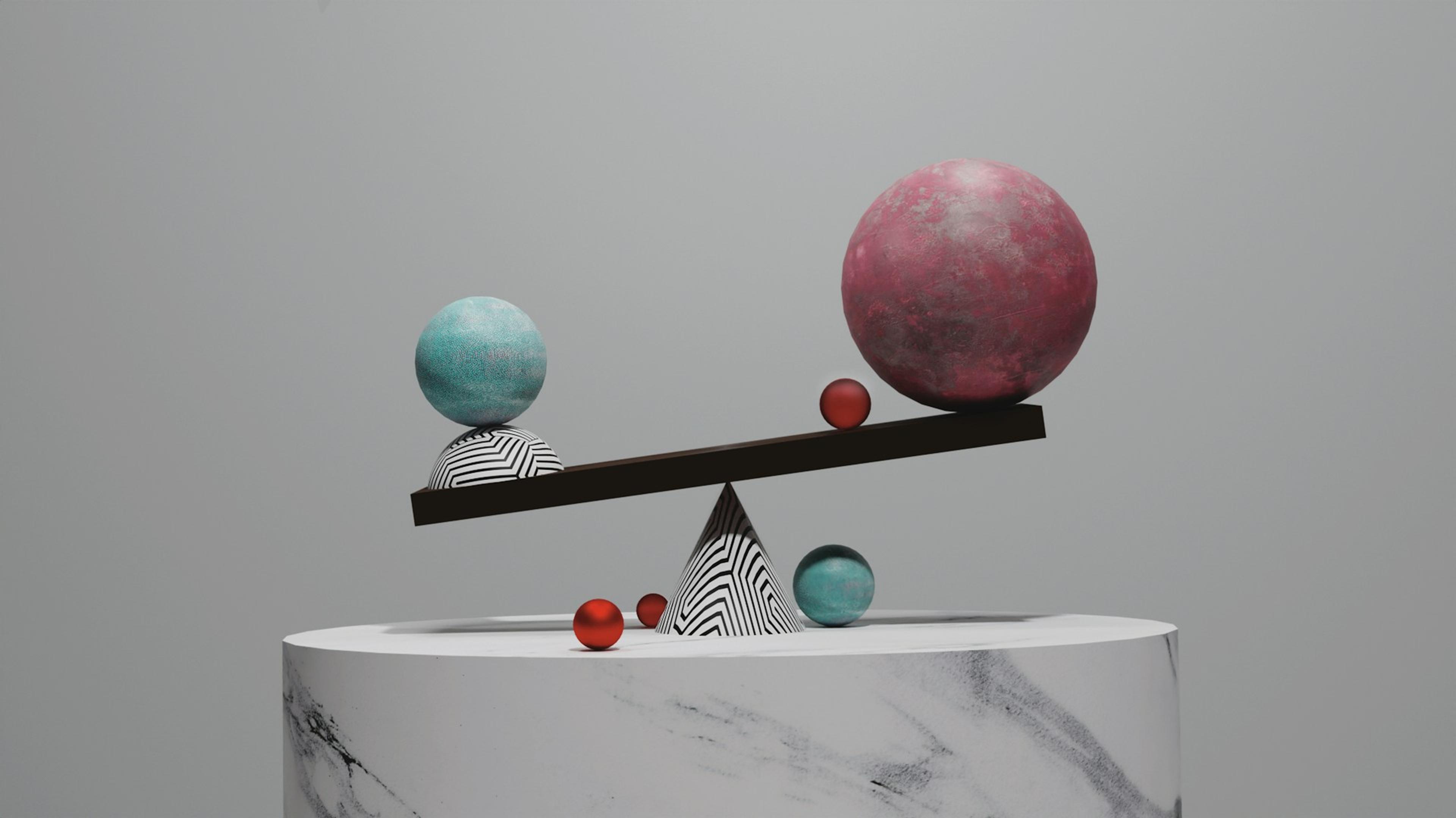 Scales balancing abstract shapes