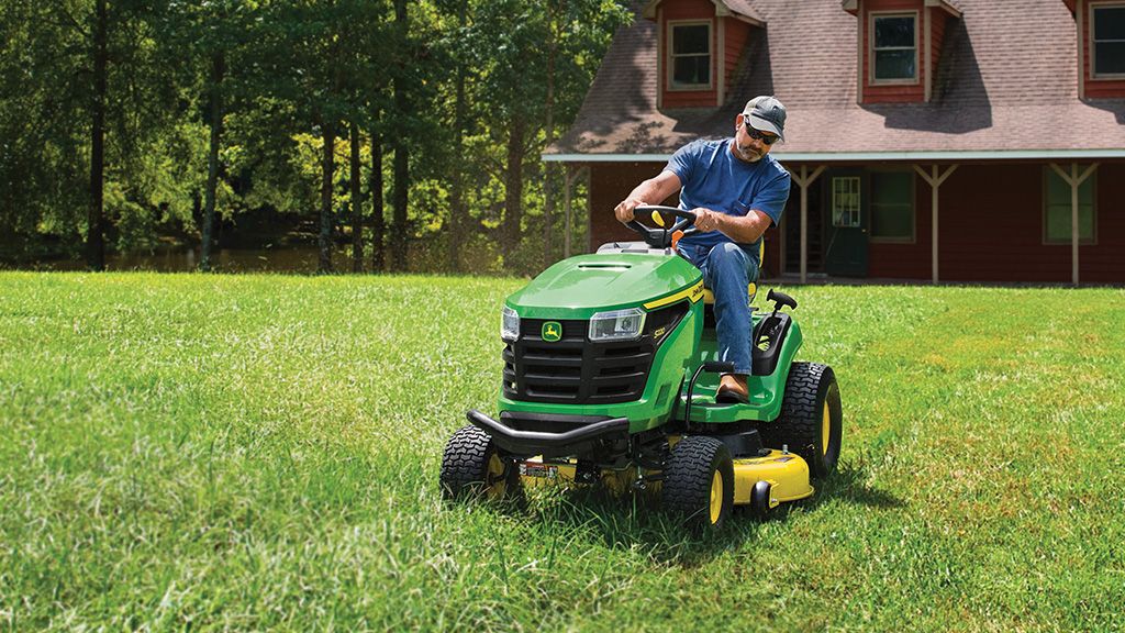 John deere cutting discount grass