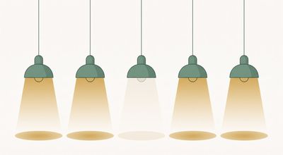 Five identical pendant lamps hanging in a row, four glowing warm gold while the one in the centre is still lit but dimmed to a faint pale glow, illustrating high-functioning depression where nothing looks different from the outside