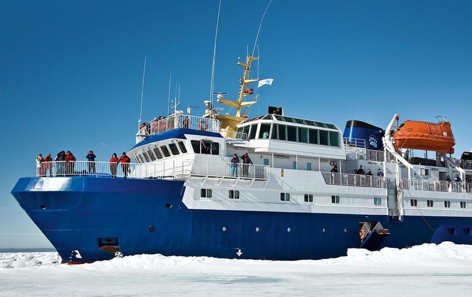 M/S Quest in the ice with guests on deck