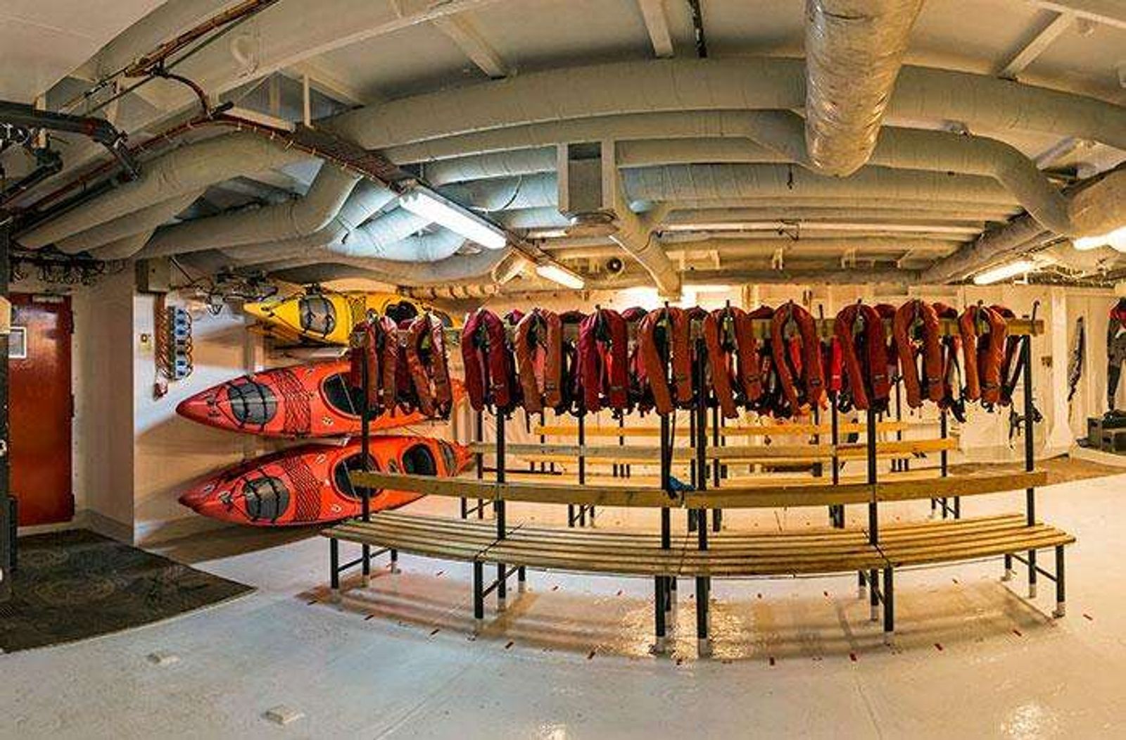 The mudroom with kayaks and expedition gear