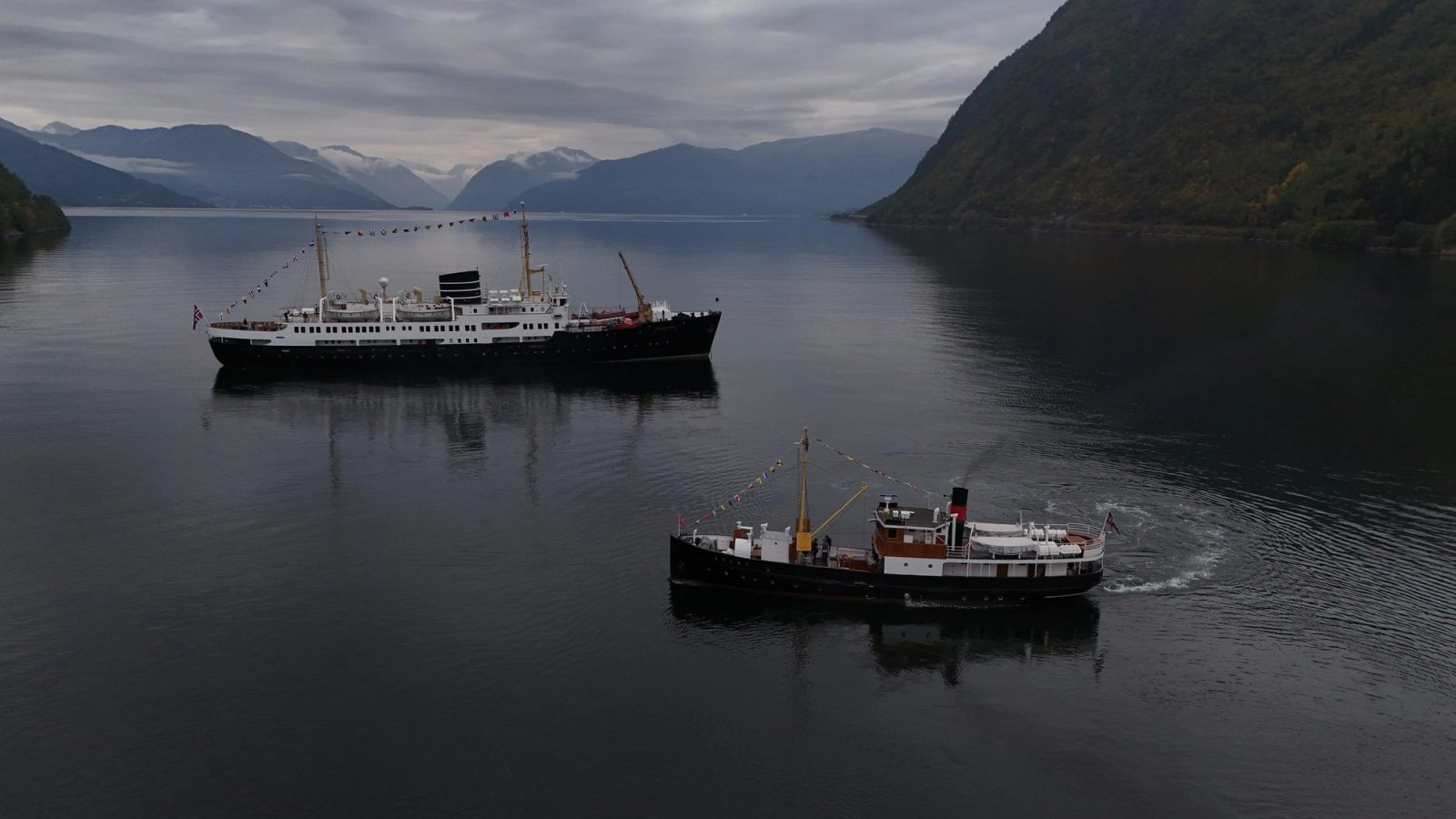 MS Nordstjernen from above in a Norwegian fjord